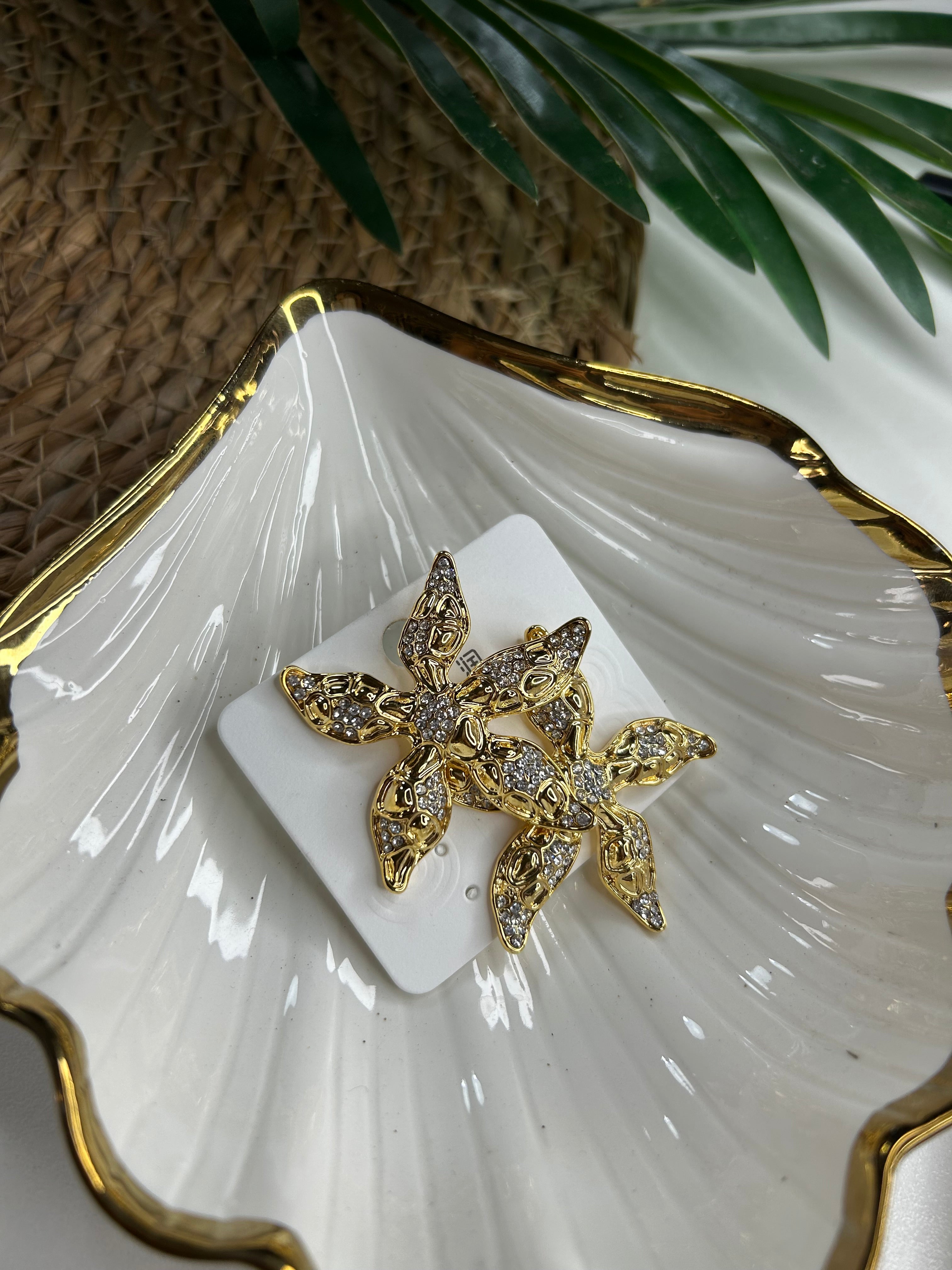 Arete estrella de mar con chispas - Joyería
