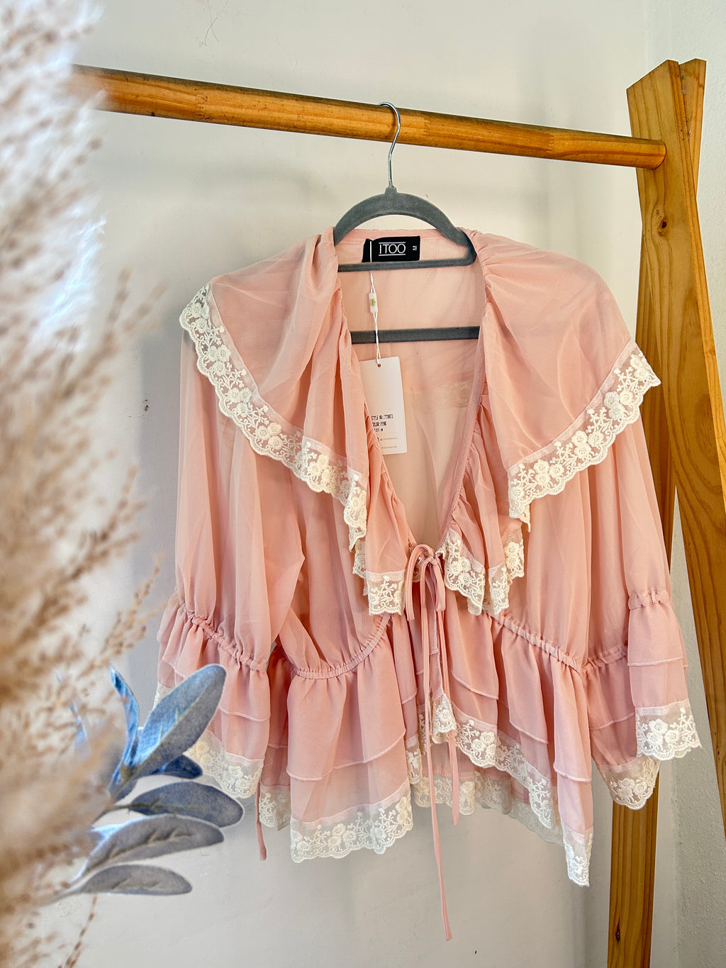 Blusa celeste y rosada